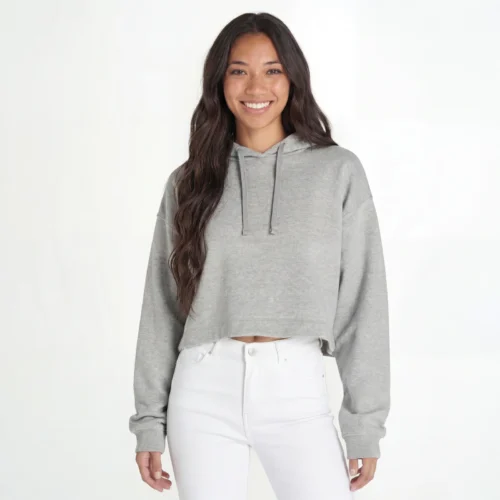 Mulher a usar hoodie cropped cinzento melange.